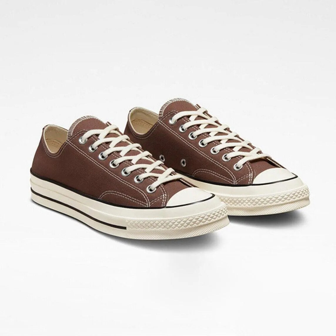 Converse marrones imagenes best sale