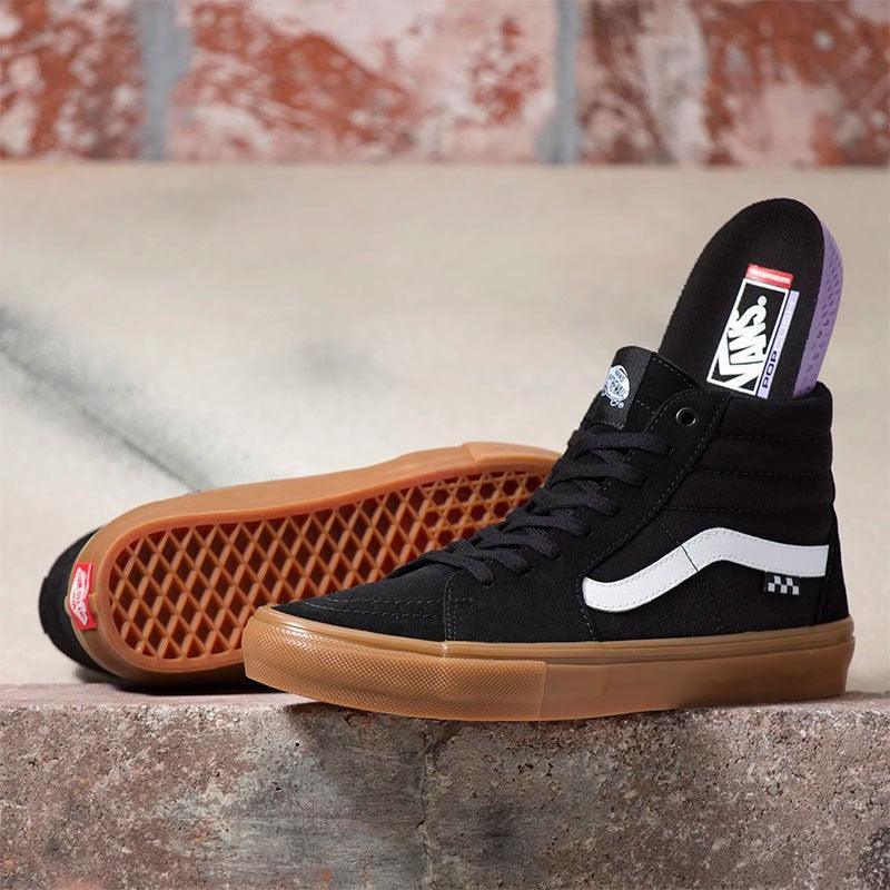 Vans negra con suela shops marron